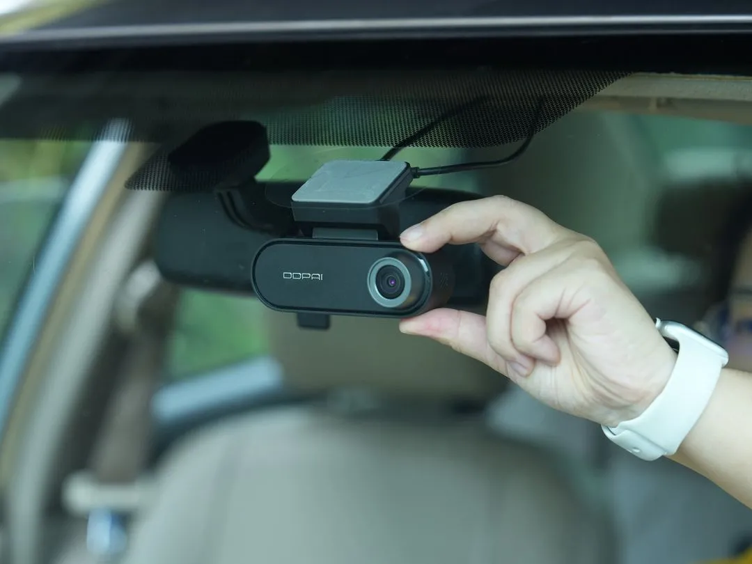 Adjusting the angle of the DDPAI N5 Dual dash cam using the app's real-time video feed.